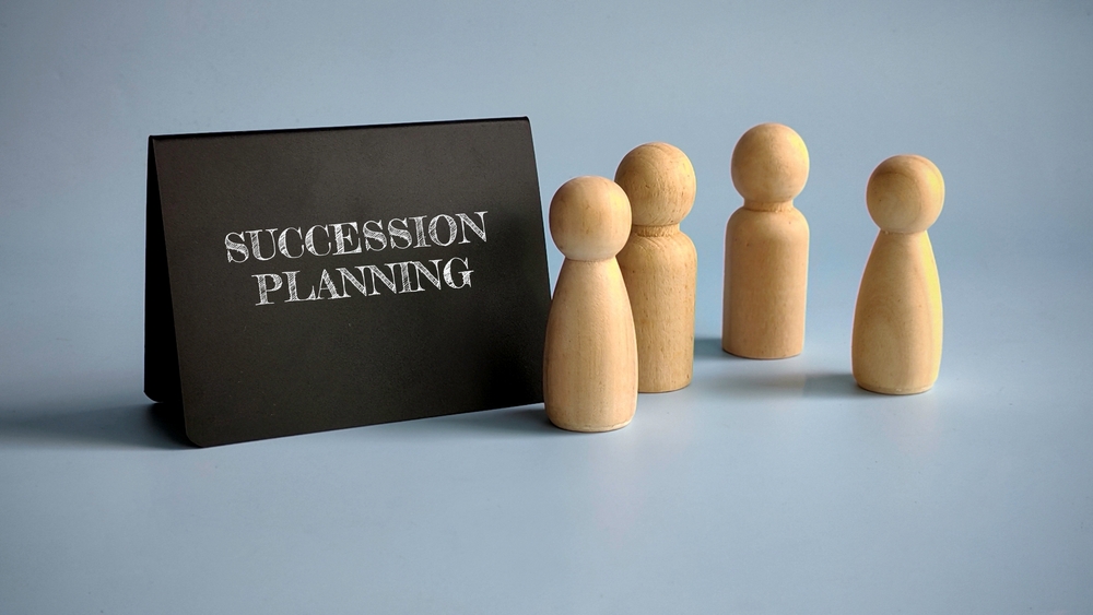 a,sign,written,with,succession,planning,with,a,group,of